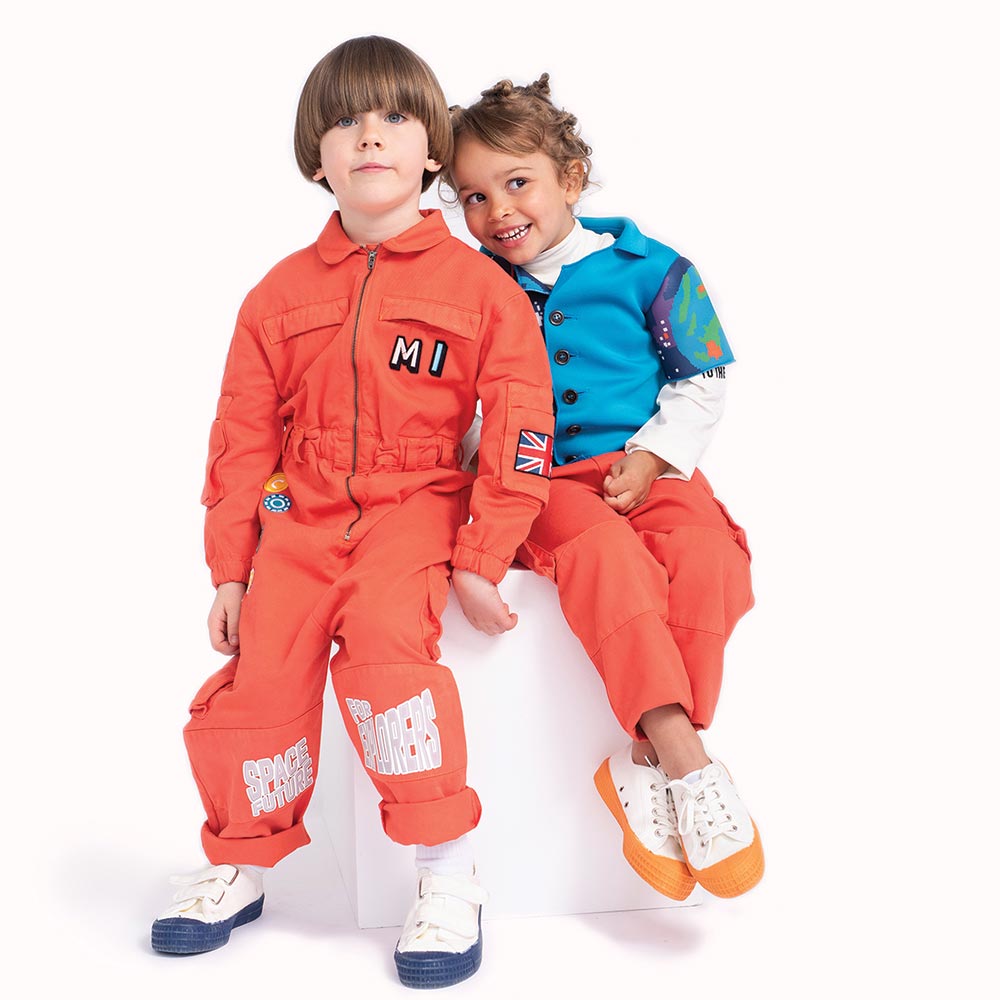 Compass Kids - 2 kids in bright clothing