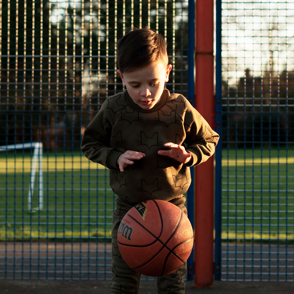 WildChild London boy bouncing basketball