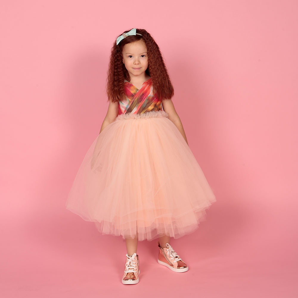 Young girl in pretty Amarah London occasionear