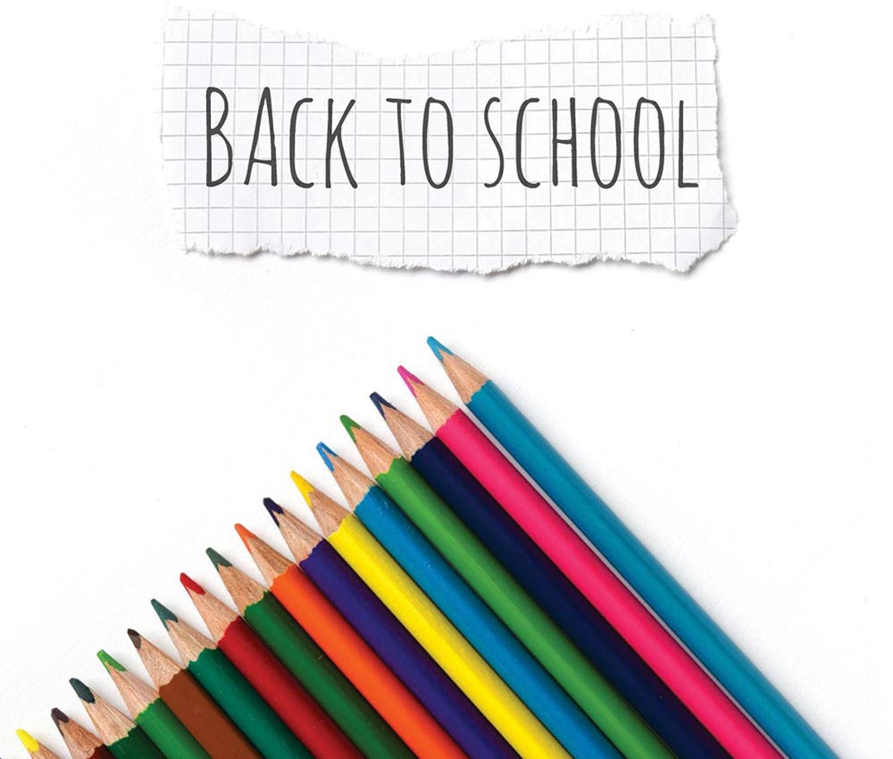 Back to School sign with coloured pencils