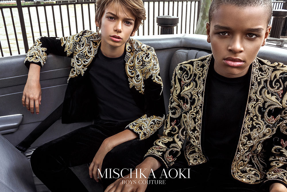 Mischka Aoki boys in black and gold jackets