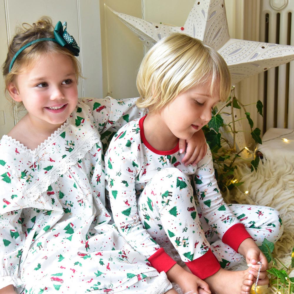 Two children in Powell Craft Xmas PJs
