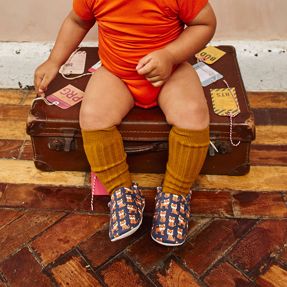 Baby in Poco Nido Moose baby shoes