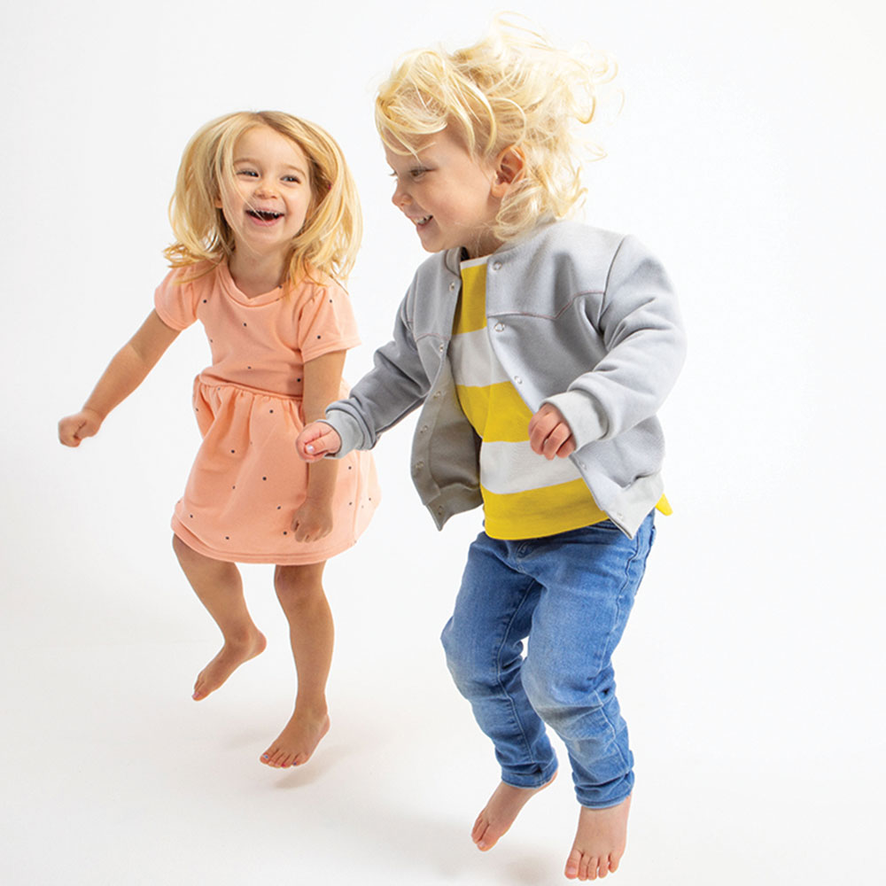 Boy and girl jumping