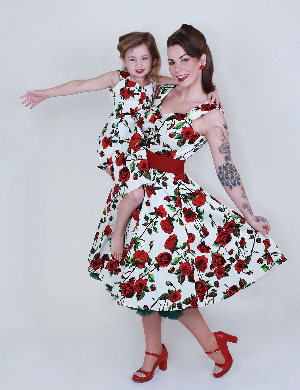 Mum and daughter in matching red floral dresses