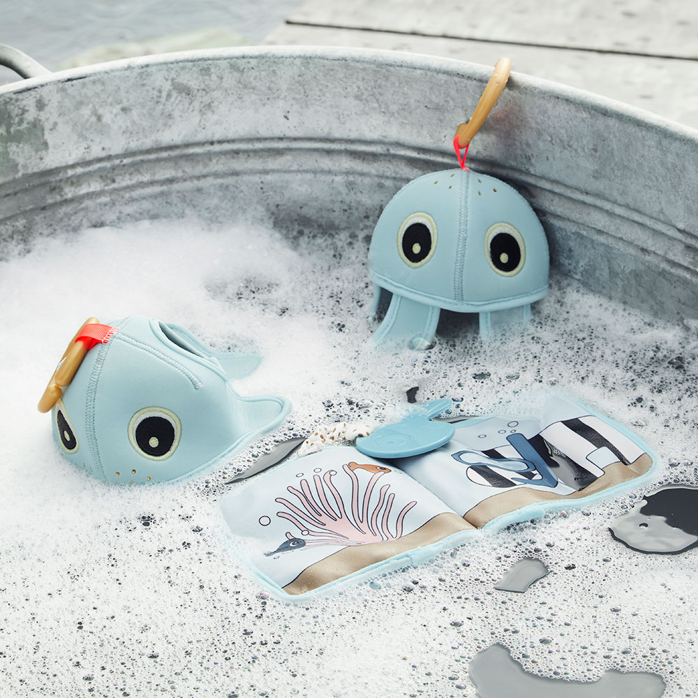 Done By Deer blue bath toys in tin bath