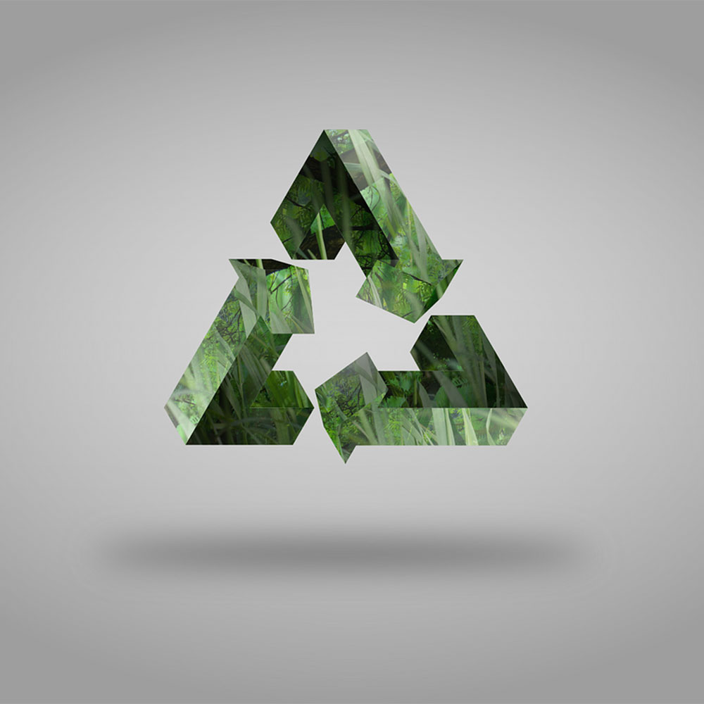 Green recycle logo on grey background