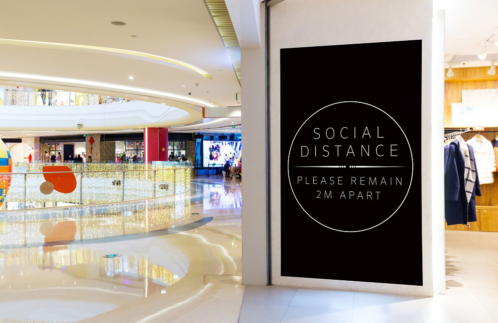 Store social distancing signage by Leach