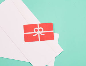 red gift card image on green background