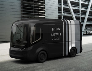 Black electric van with John Lewis logo on the side