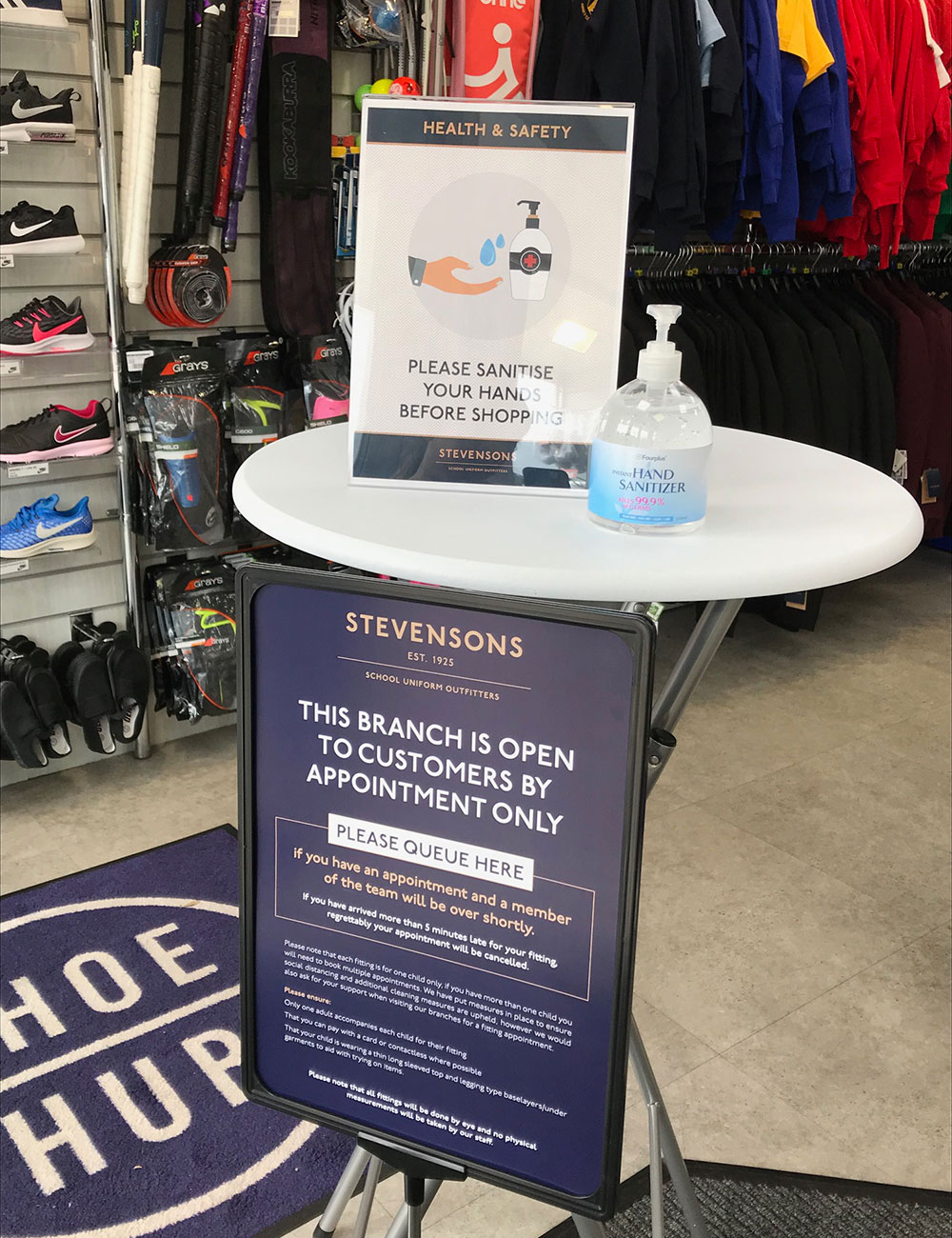 Sanitisation point for Stevensons schoolwear store