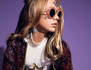 Young girl waering Zoobug glitter eyewear