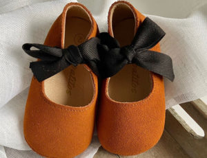 Orange Zapatitos luxuy baby shoes with black bow