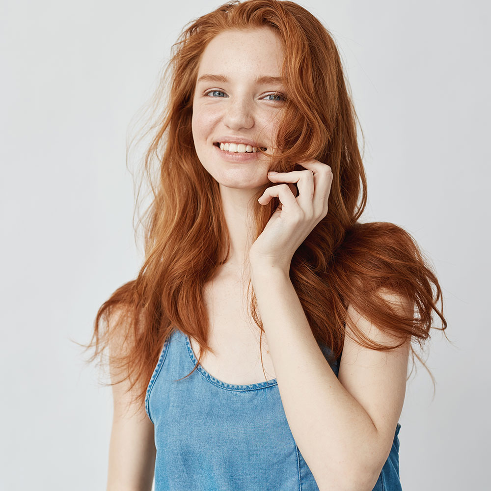 Teenage girl with ginger hair