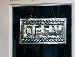 Open sign on retail store window