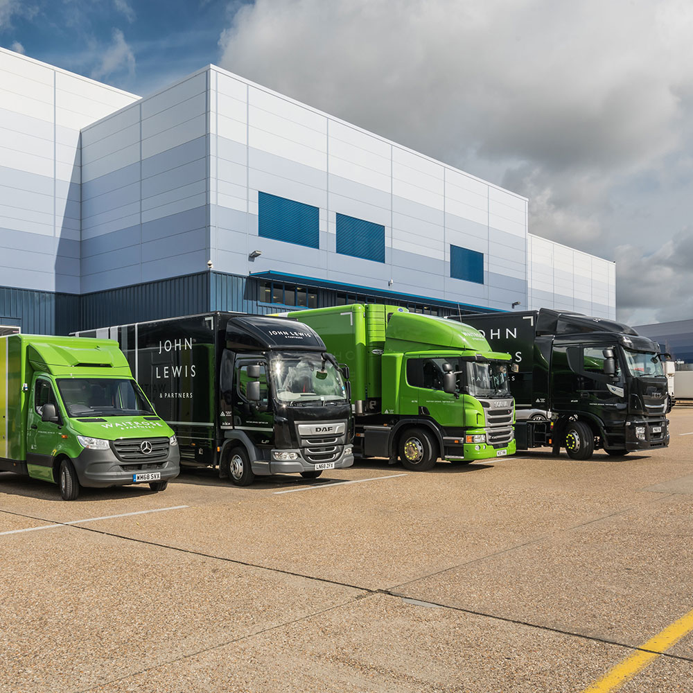 John Lewis Trucks and Vans outside delivery depot UK lockdown