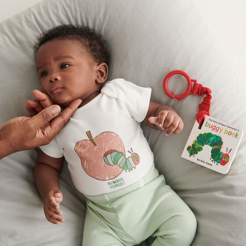 Baby with Hungry Caterpillar book and apple T Shirt