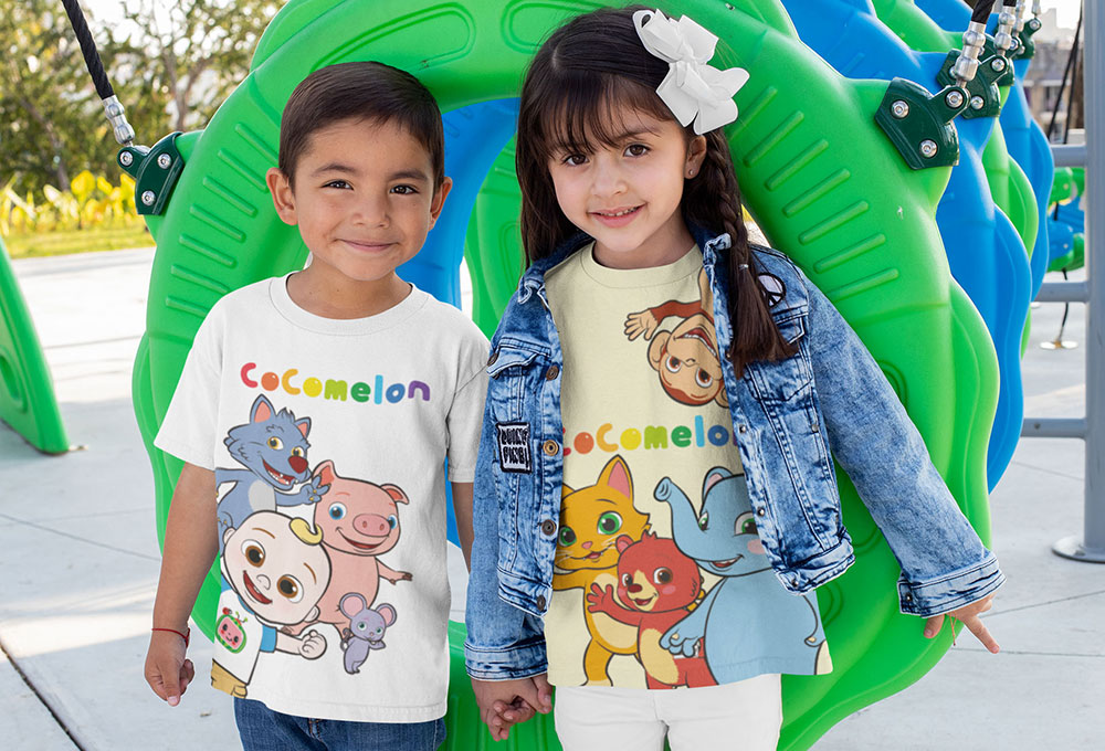 Boy and girl stood together wearing Cocomelon branded T Shirts