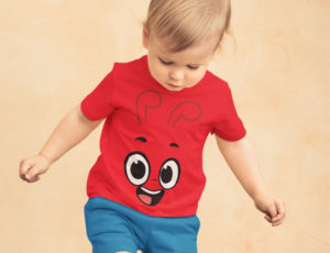 Blonded haired toddler in red T Shirt