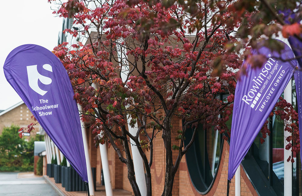 Schoolwear show purple banner