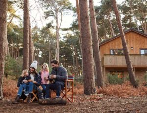A family sat outside at Center Parcs