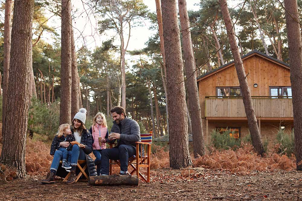 A family sat outside at Center Parcs