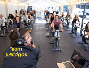 Fitness class with instructor in Team Selfridges jacket