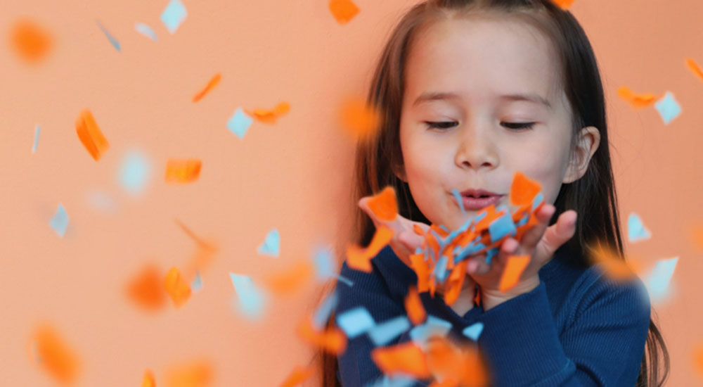 KIDLY Birthday Image of girl and confetti