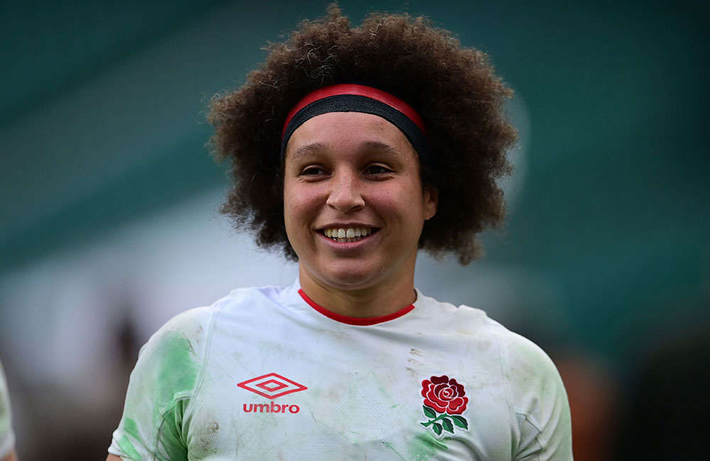 Woman England Rugby Union team in white Umbro branded kit