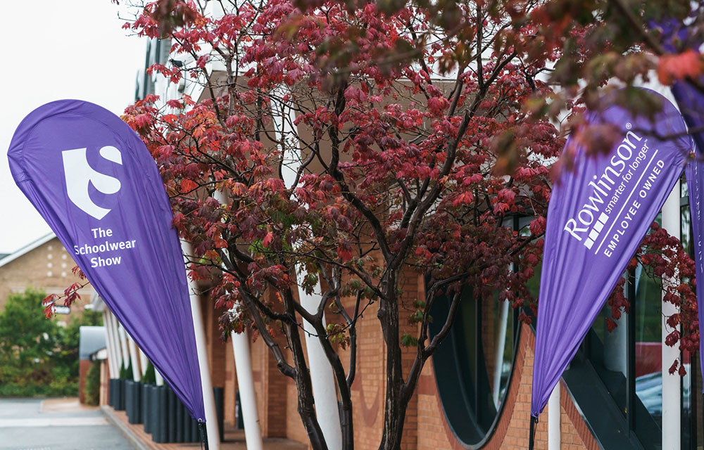 Exterior image of the Schoolwear Show with Purple branded banners