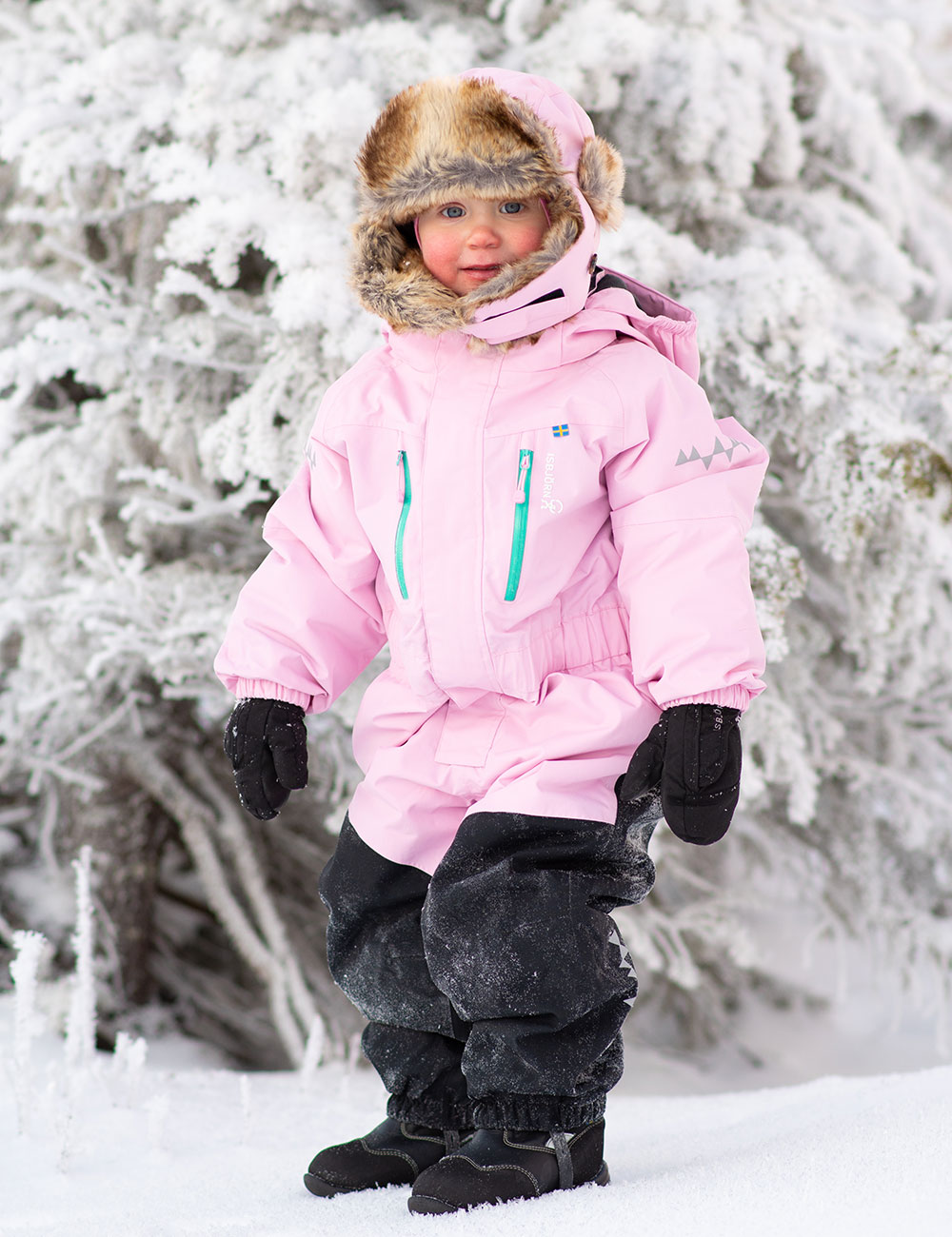 Girl in pink Penguin Snowsuit