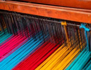 Coloured fabric on a machine