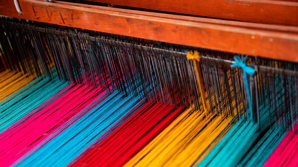 Coloured fabric on a machine