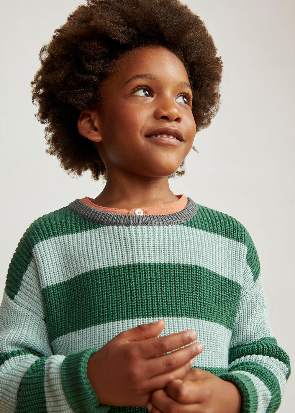 Young boy in green strip Anyday jumper by John Lewis