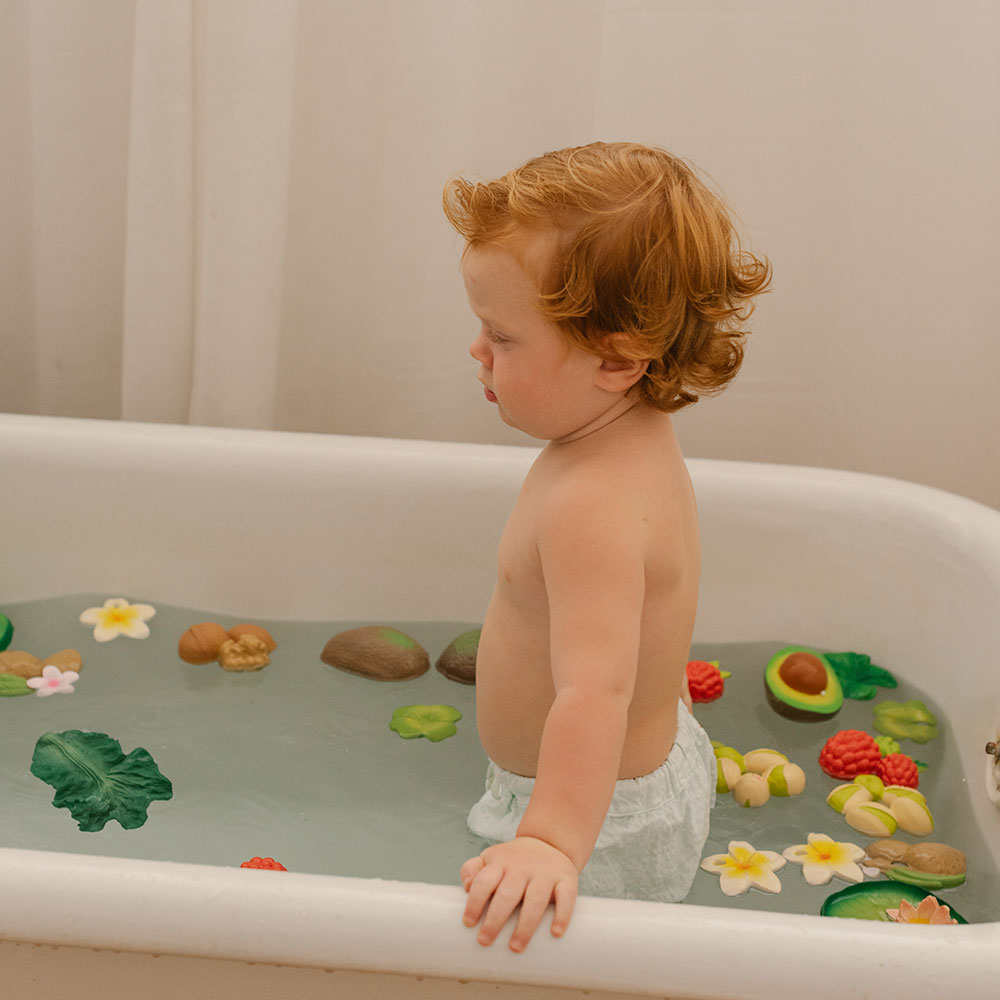 Toddler in bath with Oli&Carol Nuts and Forest Fruits collection