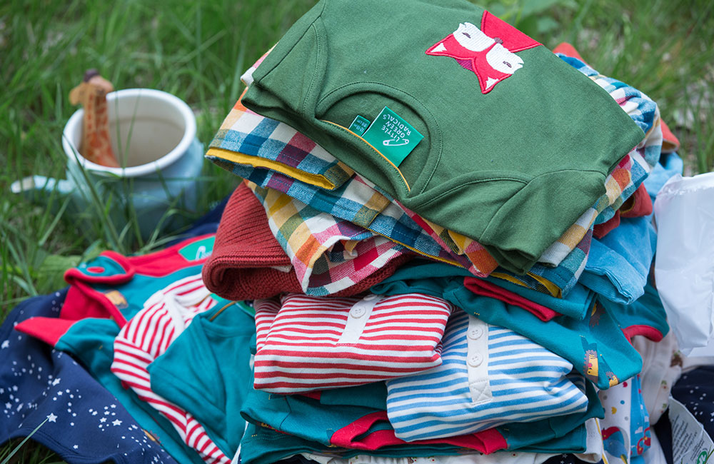 Pile of colourful childrens clothing