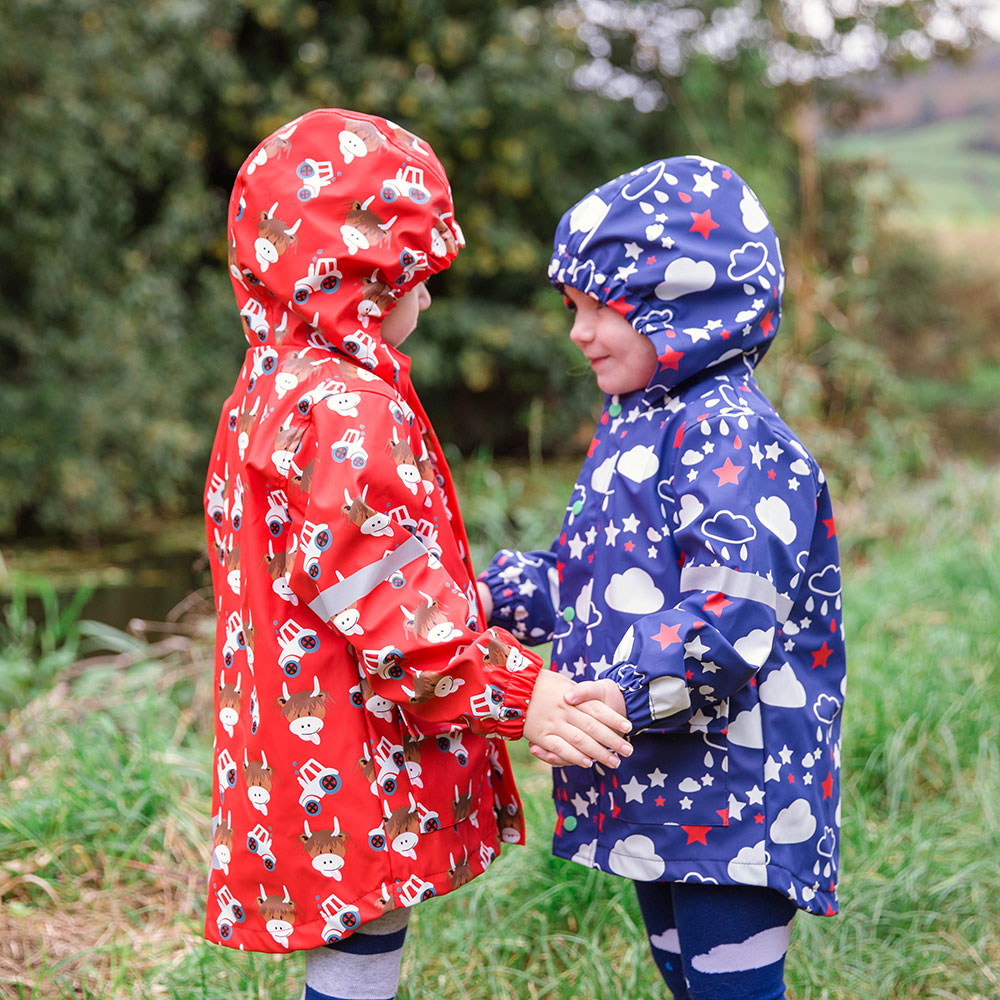 Two children in Blade & Rose raincoats