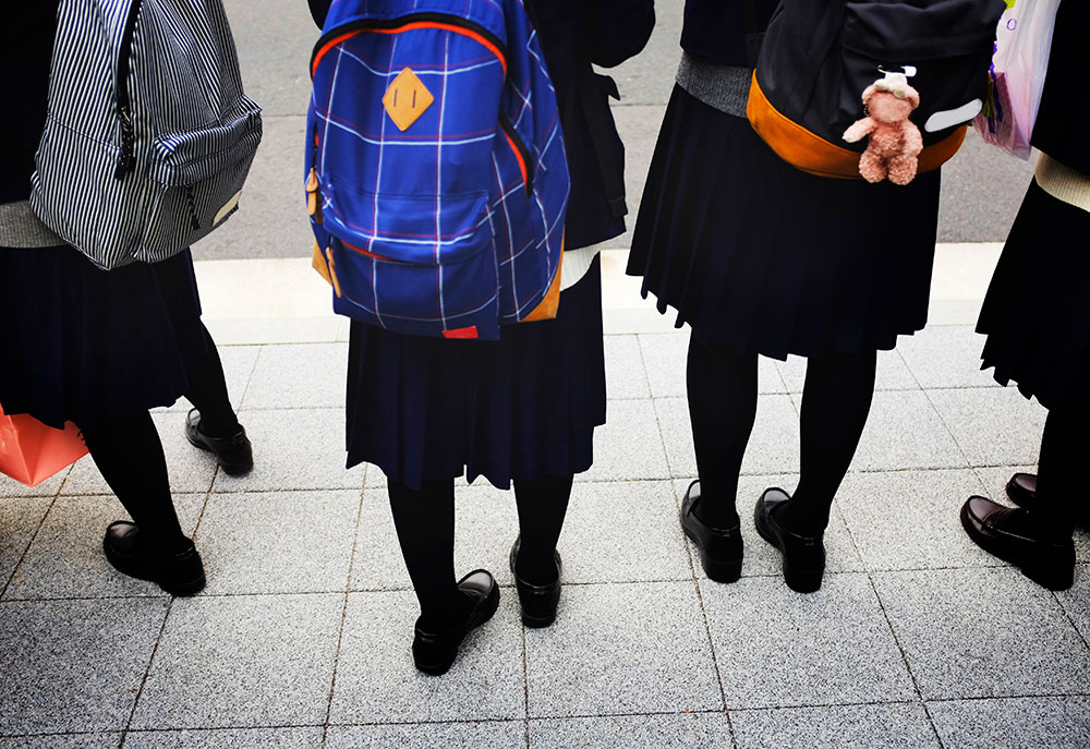 Four girls in school uniform