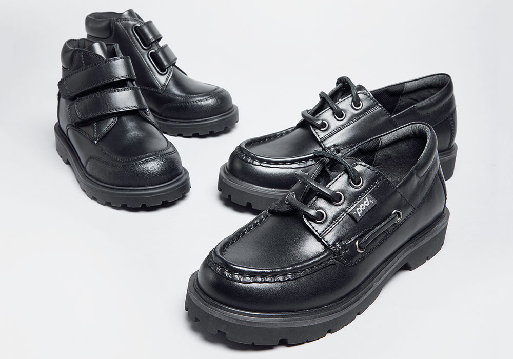 Pair of girls and boys black school shoes