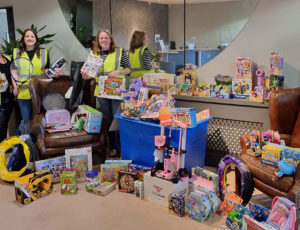 Donated Toys from INDX piled on floor
