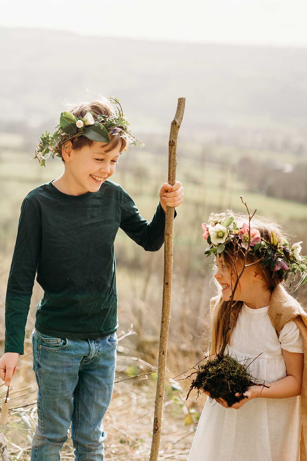 A young boy and girl in the countryside