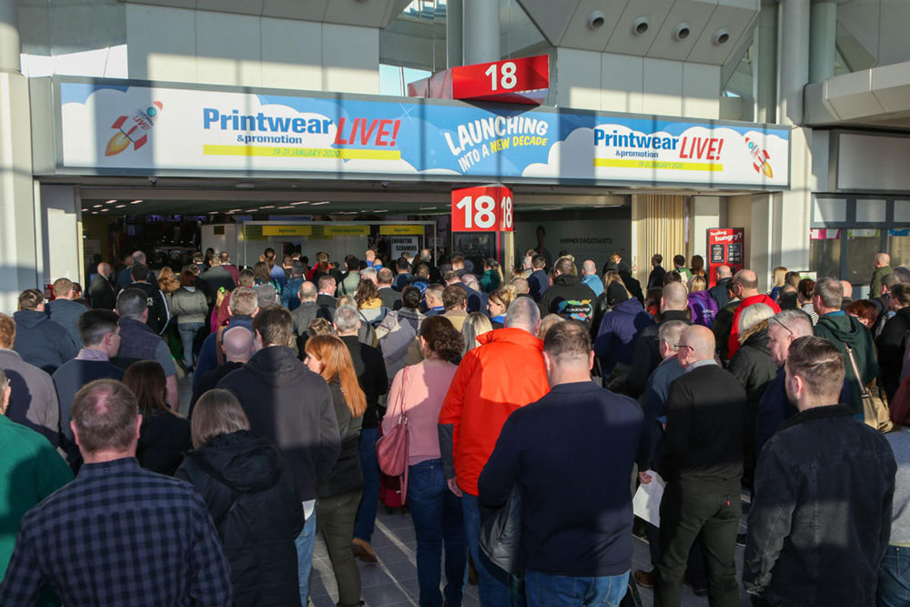 Visitors walking through the entrance to Printwear & Promotion Live!