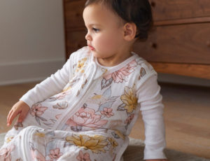 baby wearing organic cotton mulin swaddle