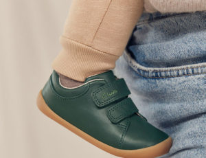Childs dark green Clarks shoe with velcro fasteners
