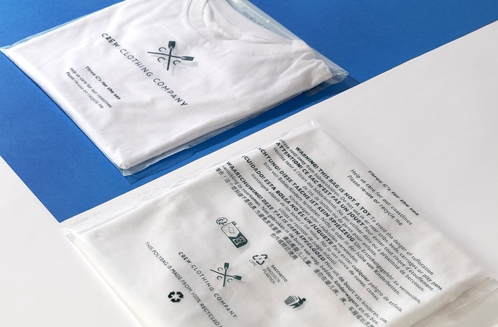 A recycled Polybag containing a Crew Clothing Company white t-shirt