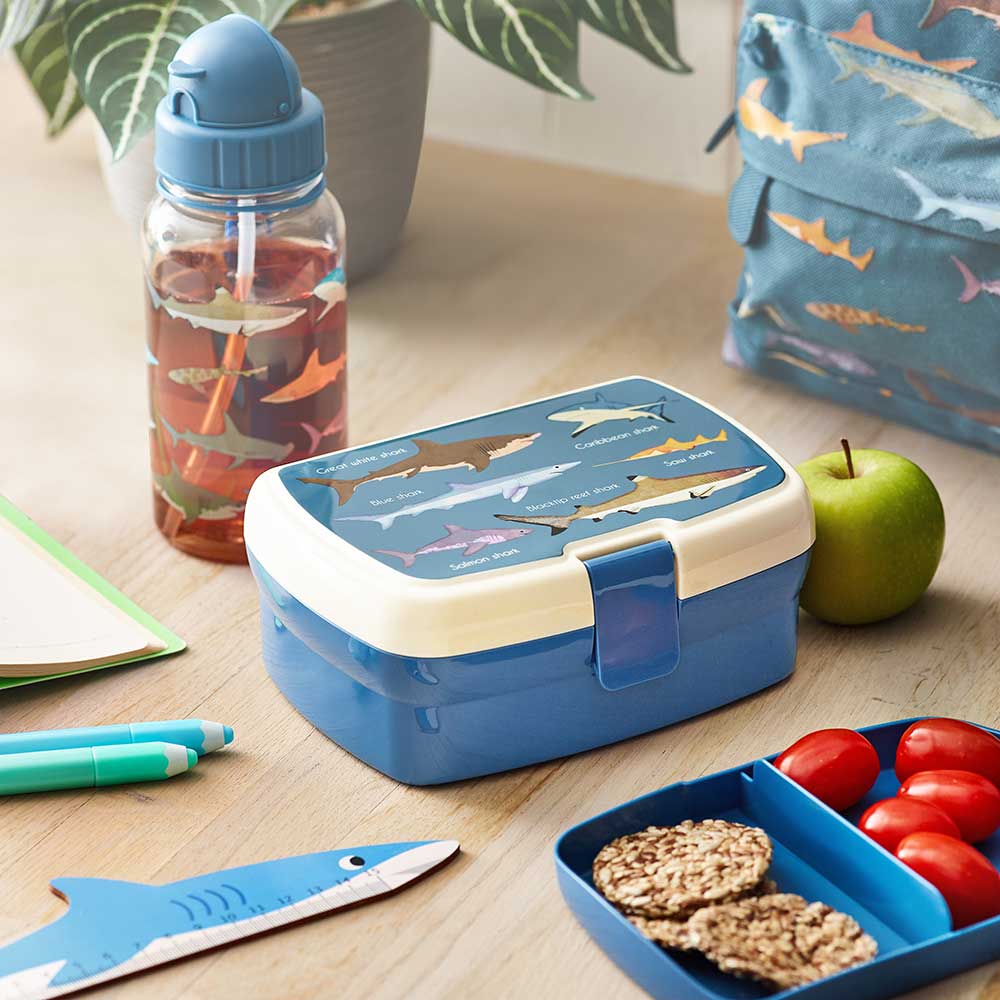 Blue and white lunch box with shark design