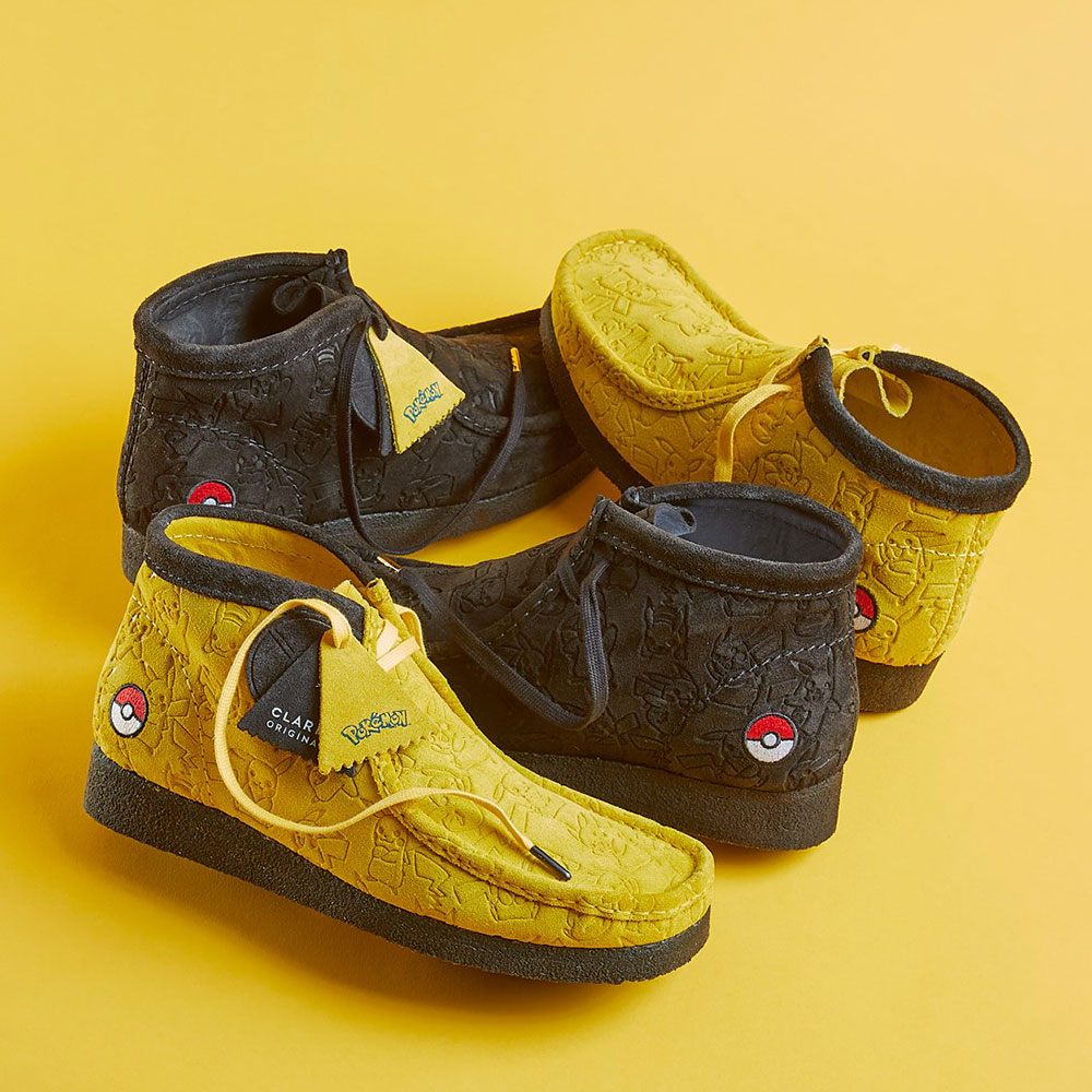 Black and yellow clarks shoes with Pokemon logo branding