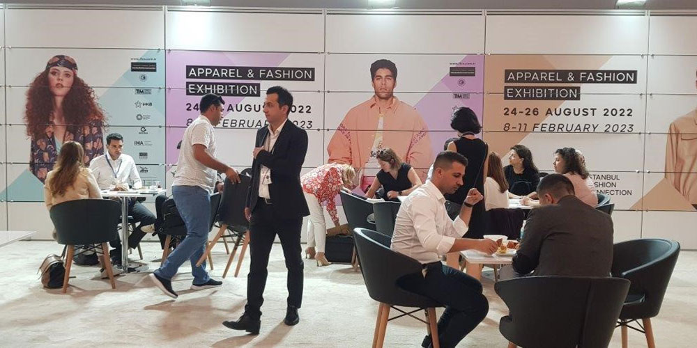 people on exhibition stands at Istanbul Fashion show