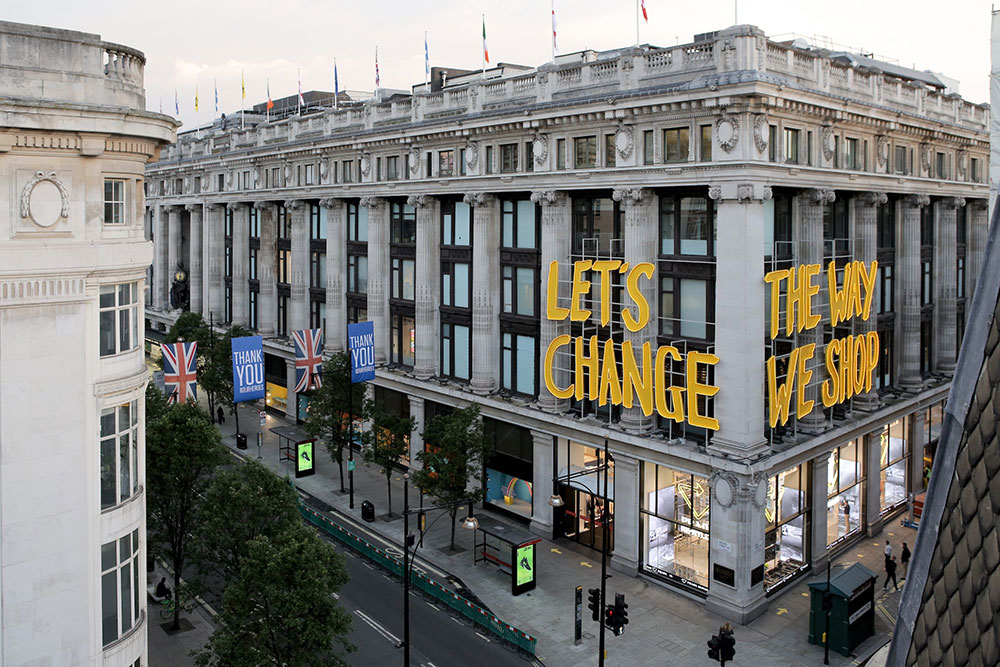 The Let's change the way we shop facade outside the Selfridges in London