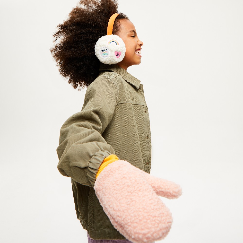 Girl wearing earmuffs and a pink mitten 